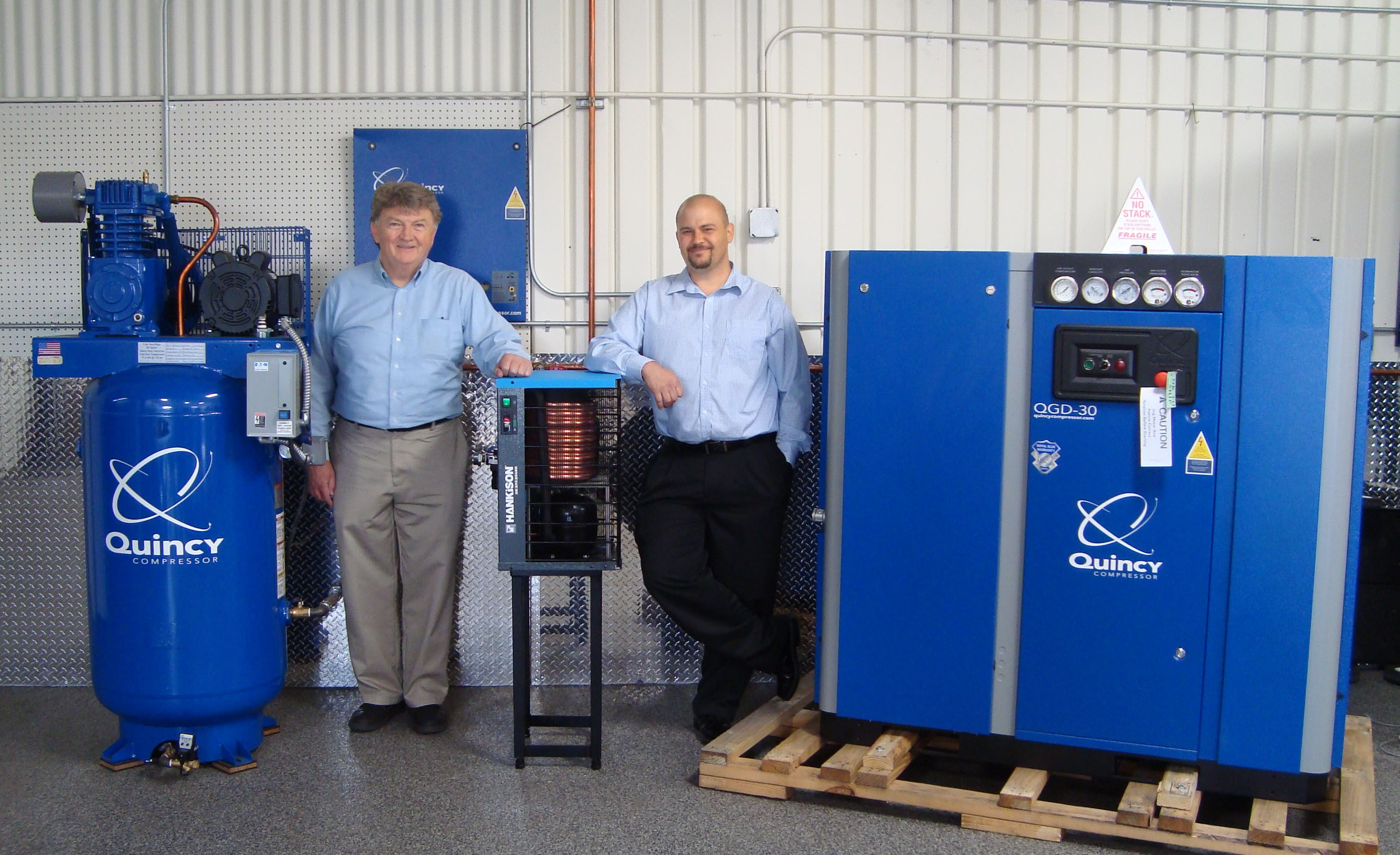 Quincy compressors in showroom